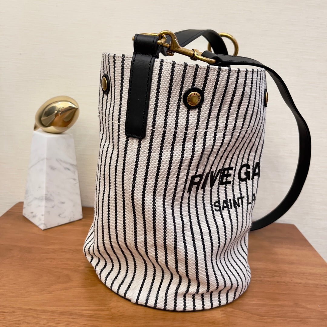 YSSL Rive Gauche Bucket Bag In Striped Canvas For Women 11.8in/30cm Black And White YSL 669299FAAE59583